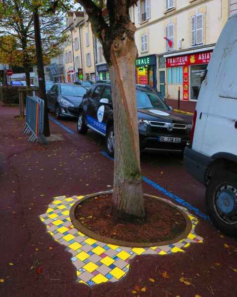 Ememem: A Mosaic Artist, uses Vibrant Mosaics to Repair Cracked Sidewalks and Potholes on the Roads