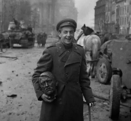 Soviet Soldier Carrying Hitler's Head across Berlin