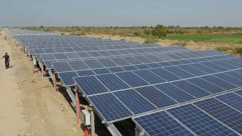 Solar Panels over Canals in India, which prevent water evaporation and increase panel efficiency