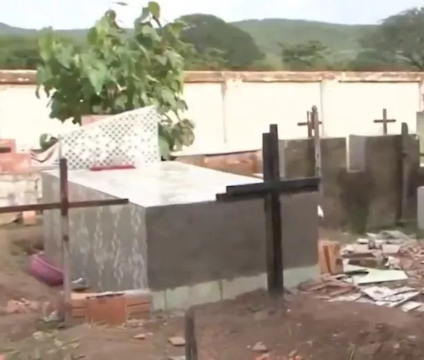 A woman who was accidentally buried alive is reported to have remained conscious inside her coffin for eleven days while attempting to fight her way out.