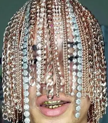 Mexican Rapper Implants Gold Chains into his Scalp, Becomes the First to Do So