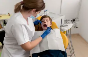 Starting to take care of your child's teeth is really important and exciting for parents in North Kansas City. When you see that first tooth coming in, it's a big moment! It means your child's teeth are starting to grow, and that's the beginning of them having healthy teeth. As they grow up, their baby teeth will fall out, followed by a replacement by permanent teeth. Knowing how teeth grow and the importance of going to the dentist early on is paramount. However, finding the right North Kansas City kids dentist for your child is key to keeping their smile healthy. This article emphasizes the importance of starting early in teeth care and highlights regular dental check-ups as key to maintaining a bright, healthy smile over time.