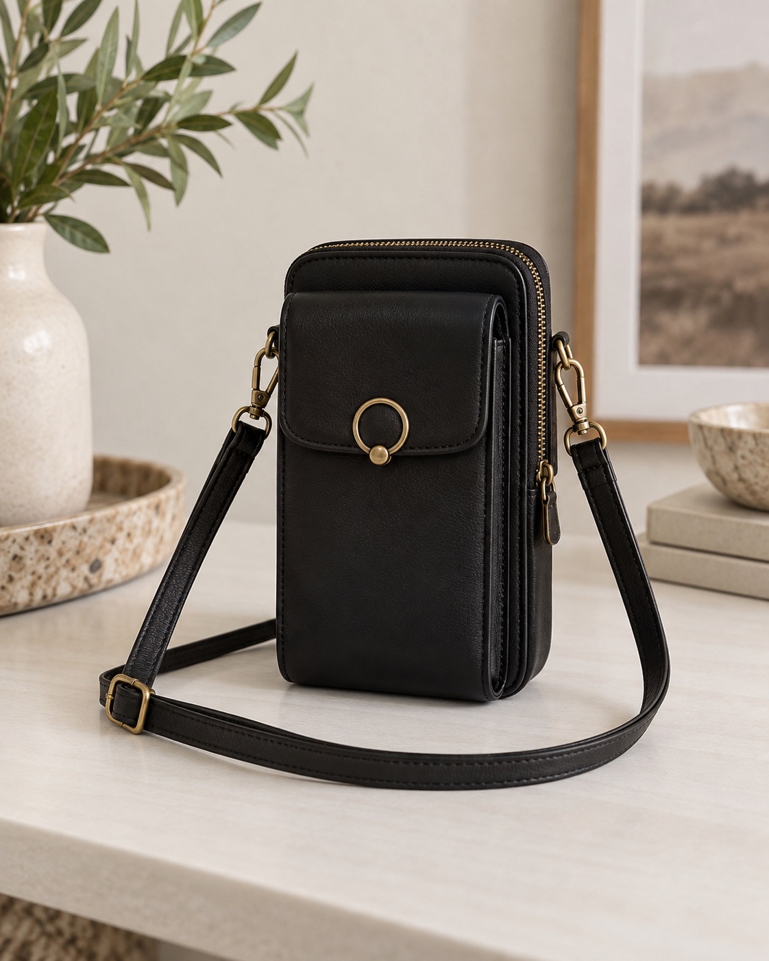 Black vegan-leather RFID phone purse with a round metal buckle