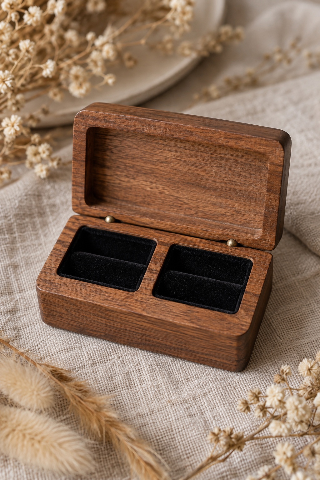 Brown rectangular wooden two-ring box with black velvet interior.