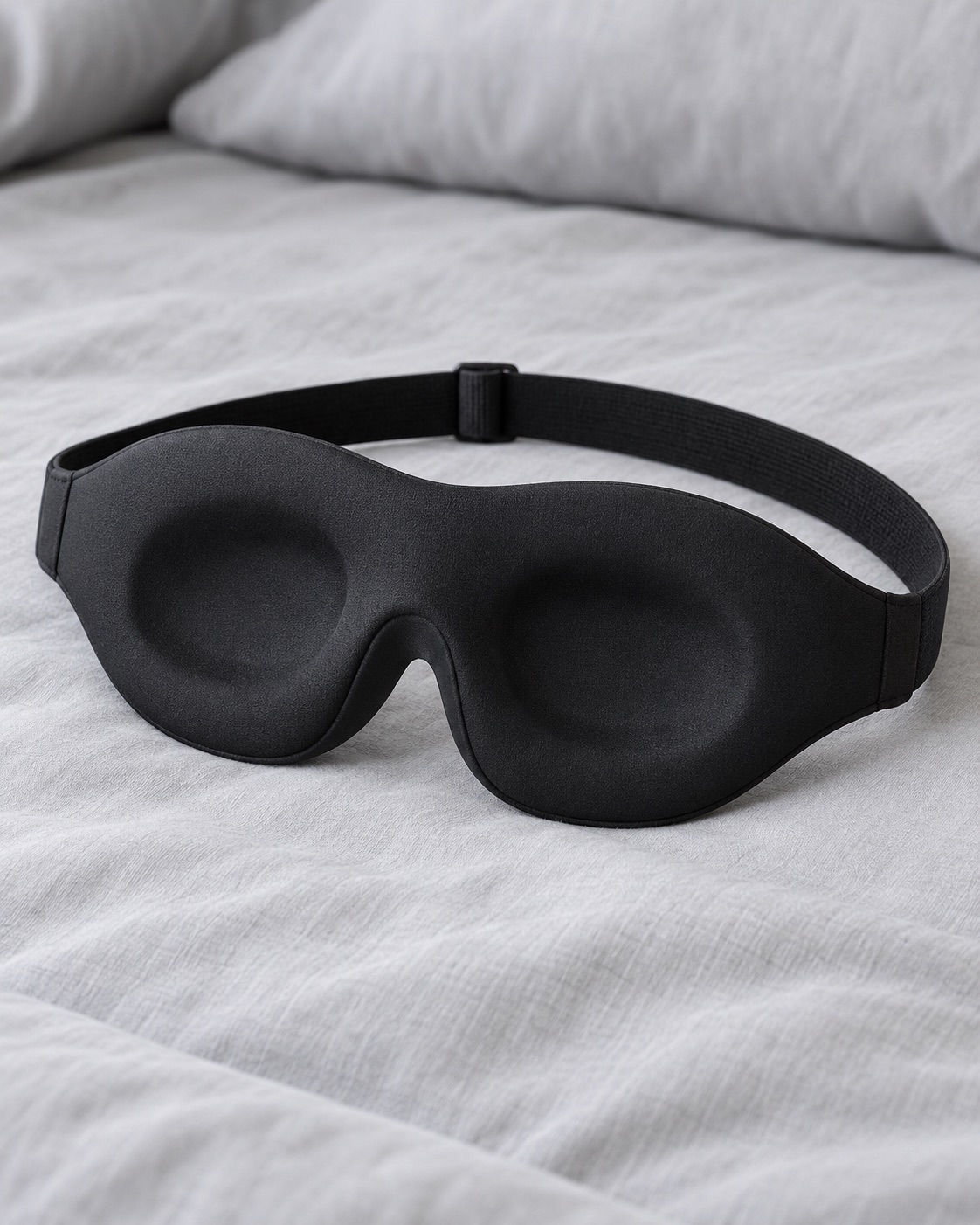 10 Contoured Sleep Masks for Side Sleepers and Bright Bedrooms Slim black contoured sleep mask with thin side wings
