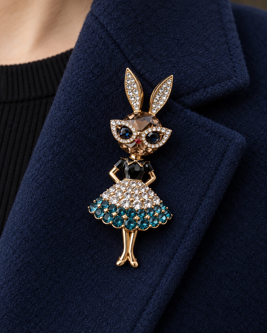 Jeweled rabbit figure brooch with crystal glasses and a teal skirt
